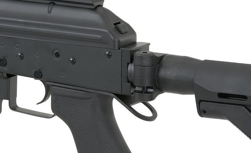 Cyma AK ambidextrous hihnakiinnike - musta